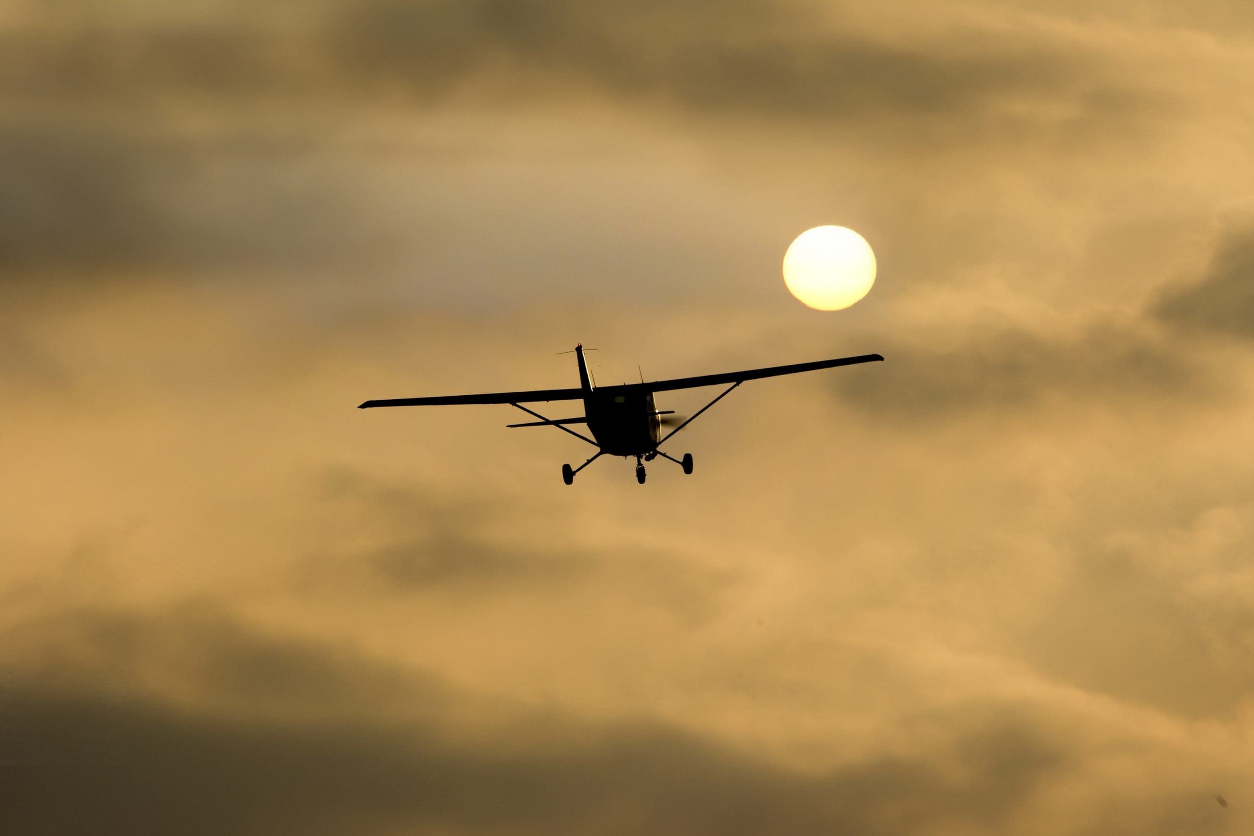 Germany, Hesse, Sports plane Cessna 152 in the evening